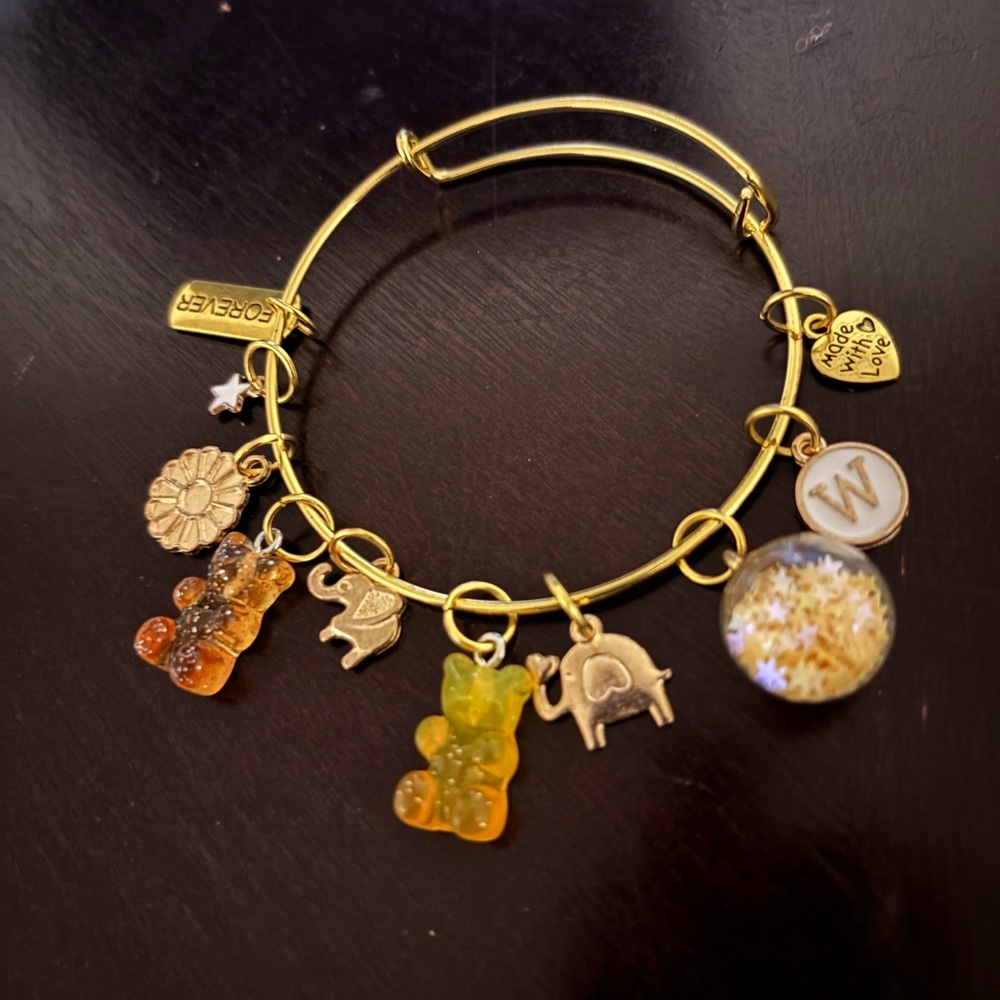 Planet Gold Charm Bracelet with Gold and Orange Accents